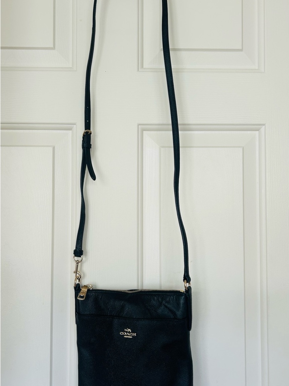 Coach Black Pebbled Leather Crossbody Pouch with Gold Accent